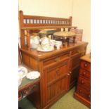 Edwardian Walnut chiffonier with mirror back over drawers and cupboard base and brass drop handles