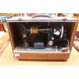 Cased Singer Sewing machine EA58687S