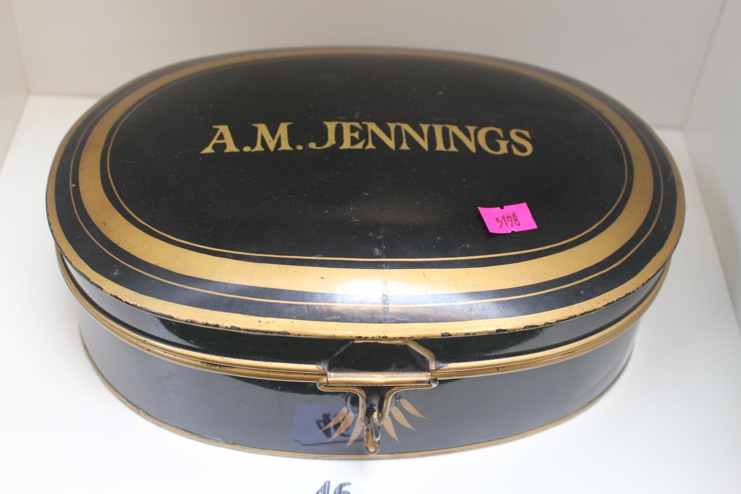 Antique Black and Gilt oval box marked A M Jennings by Ravenscroft Law wig & Robe makers of Lincolns