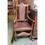 Oak 1920s Elbow chair with caned back and upholstered seat