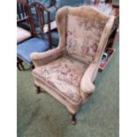 19thC Show frame wind armchair on cabriole legs with figural upholstery