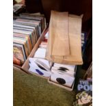 4 Boxes of assorted Vinyl Singles to include The Seekers, Suzi Quatro etc