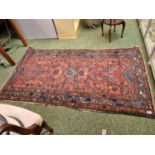 Early 20thC Persian Rug of Red ground 200cm in Length