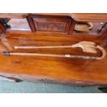 Vintage walking stick with applied metal plaques all European and a interesting tribal type stick