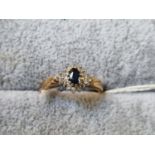Ladies 9ct Gold Sapphire & Diamond cluster ring. Size K 2.4g total weight