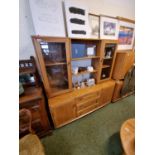 Ercol dresser with glazed doors flanking central glass shelves, base of two cupboard doors and 3