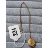 Edwardian Ladies Yellow metal engraved locket on chain 9g total weight