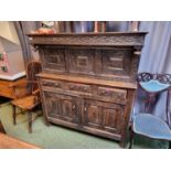 Victorian Oak Highly carved Court cabinet with drawer and cupboard base