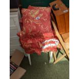 Upholstered stool with matching curtains and cushions