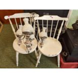 Pair of White painted ibex chairs and a Ceiling light