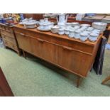 Mid Century Austin Sideboard of 3 drawers over cupboard doors and tapering legs