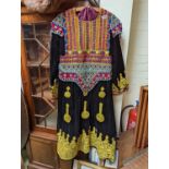 Afghan Highly decorative dress and a Fur Coat