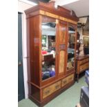Good quality Late Victorian Double Wardrobe with walnut panelled doors and drawer base with spilt
