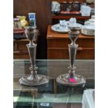 Pair of Silver Candlesticks on oval bases weighted Birmingham 1972