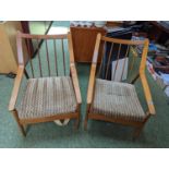 Pair of Mid Century Elbow chairs with upholstered backs and seats