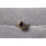 Ladies 9ct Gold Sapphire & CZ set cluster ring Size O. 2.1g total weight
