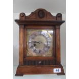 HAC Oak cased Mantel clock with roman numeral dial