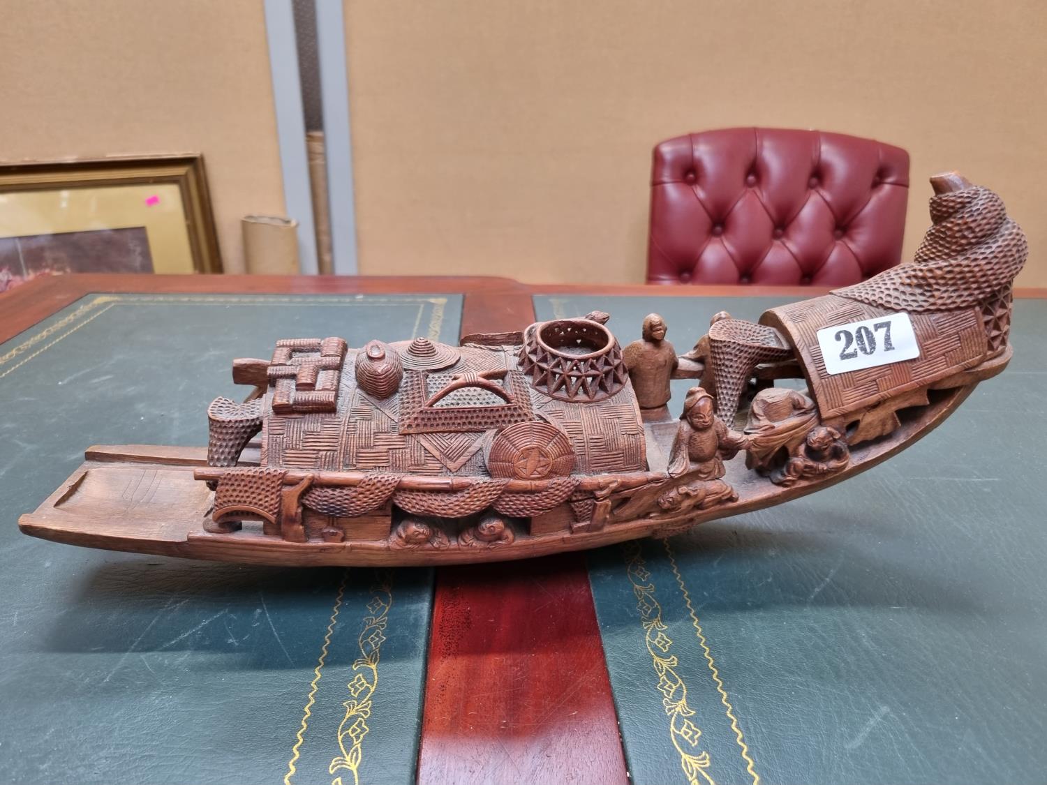 Chinese bamboo model of a fishing sampan, Qing dynasty, carved with a variety of figures and fishing