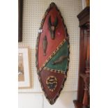 African Carved wall shield with animal decoration