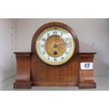 Edwardain Walnut Cased mantel clock with numeral dial