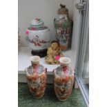 Pair of Satsuma figural decorated vases, Ginger jar on wooden stand, lidded Famille Rose vase and