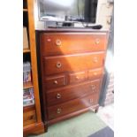 Stag Chest of 7 Drawers with metal drop handles on bracket feet