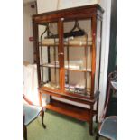 Edwardian Mahogany china cabinet with shaped under tier