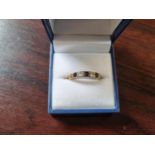 Ladies 9ct Sapphire and stone set ring Size P. 3.2g total weight