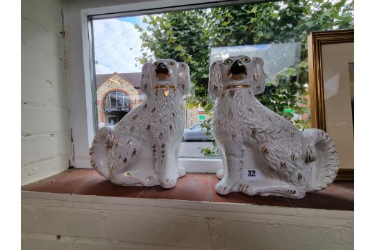 Pair of Large Staffordshire Fireside dogs with gilt applied decoration