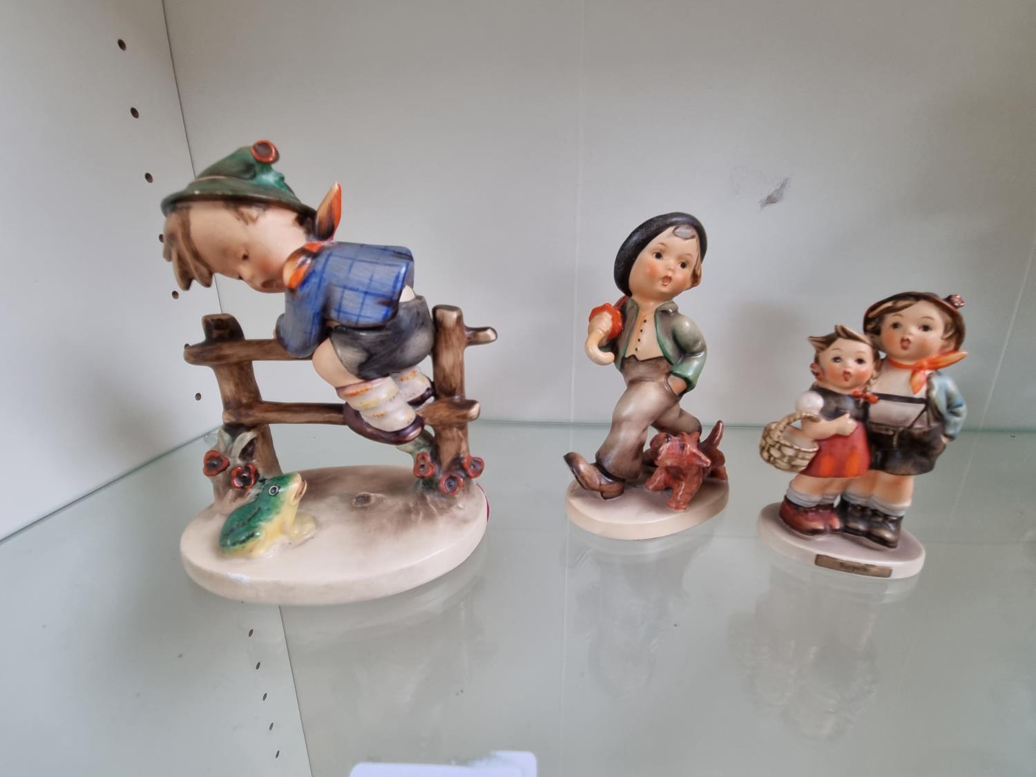 3 Hummel figures to include 'Surprise', 'Retreat to Safety' and another