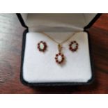 Pair of 9ct Gold Opal and Garnet set cluster earrings and matching necklace
