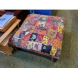 Large patchwork upholstered gout stool on turned legs