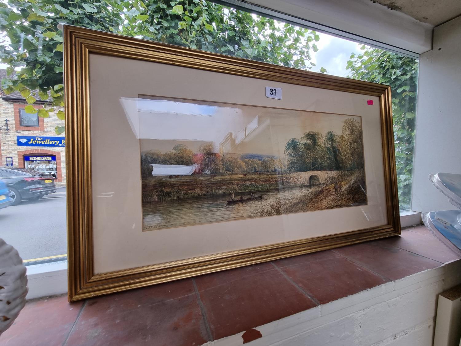 Gilt framed Watercolour of a river scene signed to bottom left