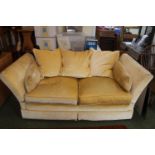 Good Quality Yellow velour Knoll Sofa for 2 with multi coloured stays and casters to base