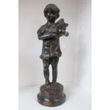19thC Bronze figure of a young girl with a Bouquet of flowers on circular base. 29cm in Height