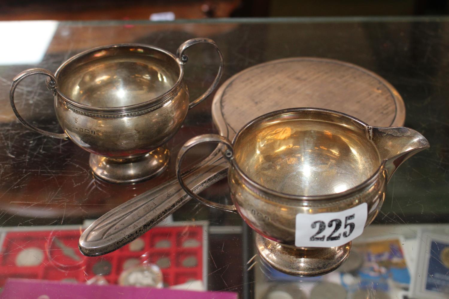 Early 20thC Silver Cream jug and sugar bowl Birmingham 1933 244g total weight and a Silver