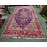 Large good quality Persian Red ground rug of floral design 400cm x 307cm