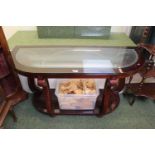 Glass topped console table with under tier