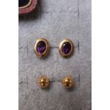 Pair of 9ct Gold Amethyst set earrings and a Pair of 9ct gold studs