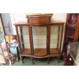 Modern glazed bow fronted china cabinet on fluted legs