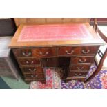20thC Leather topped Ladies kennel desk with metal drop handles on bracket feet