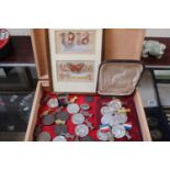 Collection of assorted Royal Commemorative medallions and 2 framed WW1 Silk postcards