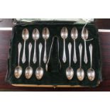 Cased Mappin & Webb Teaspoon and Sugar Tong set 200g total weight Sheffield 1931