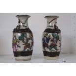 Pair of Late 19thC Chinese crackle glaze vases figural decorated with carved character marks to