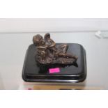 Bronze sculpture of an Angel / Putti mounted on wooden base 10cm in Length