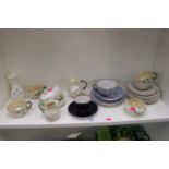 Collection of Belleek Shamrock pattern tea ware and Russian Blue underglaze gilded trio and a