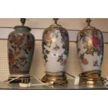 3 20thC Floral decorated table lamps with applied gilded detail