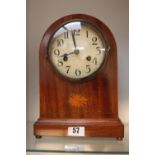 Edwardian domed top mental clock with inlaid detail and numeral dial