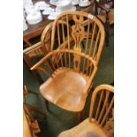 Good quality Elm carved Elbow chair with crinoline stretcher (matches previous lot)