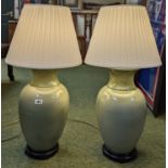 Pair of Large Chinese celadon glaze lamps with brass fittings on hardwood bases, with classical